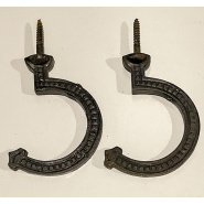 Circa 1890 Embossed Bridge/Triangle Hook (cast iron) - matched pair